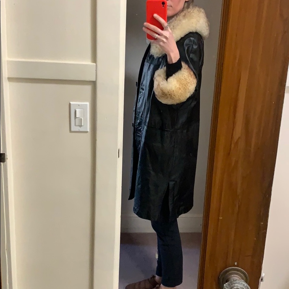 Faux fur collar and sleeves, black leather jacket!